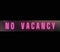 Vintage Pink neon No Vacancy sign.