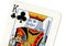 Vintage playing card showing a close up of the king of clubs.