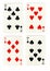 Vintage playing cards showing four sevens.