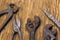 Vintage pliers, scissors, wrench on the table