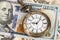 Vintage pocket watch clock on dollar banknote concept for money time value