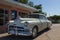 A vintage Pontiac car parked along the US route 66 in the city of Tucumcari