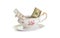 Vintage porcelain sauce-boat with dollar bills