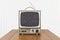 Vintage Portable Television on Wood Table with Static Screen