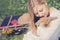 Vintage portrait photo of teenager girl with bunny in the nature