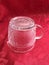 Vintage Pressed Glass Clear Crystal Cream Pitcher on red Background