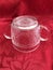 Vintage Pressed Glass Clear Crystal Sugar Bowl Details on red Background