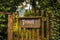 Vintage private sign on an old wooden gate