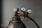 Vintage propane gas tank with pressure meters. Close-up image of
