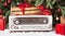 A vintage radio playing classic Christmas tunes