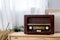 vintage radio with shelf on the wooden cabinet