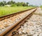 Vintage railway with ballast and rail sleepers in countryside, T