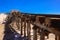 Vintage railway. Old rails at a salt factory. Mountain of sea salt. Blue sky