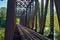 Vintage railway trestle crossing the river