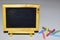 Vintage rectangular chalkboard with colorful chalk isolated on white background