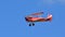 Vintage Red 1949 Stampe Vertongen Biplane in flight