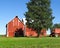 Vintage red barn on blue sky in NYS