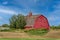 Vintage red barn in a farmyard on the Saskatchewan prairies