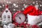 Vintage red clock, Santa hat , decorative house, branches fur