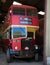 Vintage Red double-decker bus in garage ready for annual Devon coastal run, Winkleigh, United Kingdom, August 5, 2018