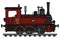 The vintage red small tender steam locomotive