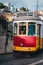 Vintage red tram in the city center of Lisbon. City touristic landmarks of Lisboa Lissabon