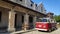 vintage red Volkswagen van in front of old building - Yogyakarta, 18 August 2020