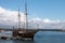 Vintage restored Caravel ship anchored