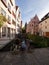 Vintage retro bike bicycle used as decoration with flowers in basket in historic charming old town of Ulm city Germany