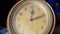 Vintage Retro Clock with a Yellow Scratched Dial. Twelve O'clock. Noon. Zoom