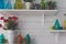 vintage retro glass bottle decorating on shelf on white wall