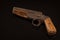 Vintage retro handgun pistol isolated on black background