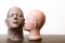 Vintage retro mannequins head with zombie head