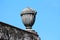 Vintage retro old concrete roof decoration in shape of large flower pot on edge of abandoned movie theater