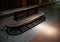 Vintage and retro wood bench with dirty birds droppings and excrement in darkness