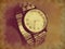 Vintage retro wrist watch in antique sepia color old version