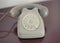 Vintage rotary phone grey front dull