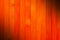 Vintage rough orange color wooden partition wall texture background.