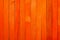 Vintage rough orange color wooden partition wall texture background.