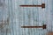 Vintage rural wooden gate with rusted iron elements