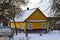 Vintage russian village, village of Belarus. Ancient yellow wooden traditional house