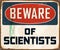 Vintage Rusty Beware of Scientists Metal Sign.