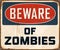 Vintage Rusty Beware of Zombies Metal Sign.