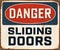 Vintage Rusty Danger Sliding Doors Metal Sign.