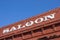 Vintage saloon letters on a red brick building in Nevada City