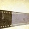 Vintage sepia textured film strip frame or background