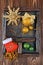 Vintage shadow box with golden and green christmas ball on wood background