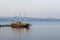 Vintage ship in dock ocean bay calm waters scenic nautical view , copy space for your text here