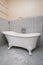Vintage shower bath tub in colonial interior style