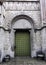 Vintage side entrance in Church of St James the Apostle in Torun